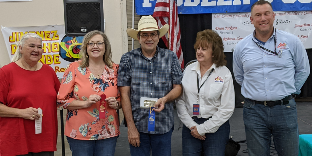 Marty Elmore, Karla Stinehart and Cindy Collins receiving award for Fiddler's Contest