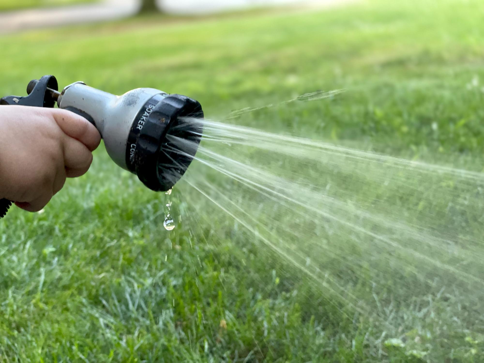 Water sprinkler hose attachment
